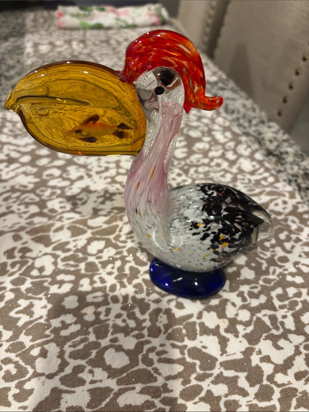 7” Hand-Blown Glass Pelican with fish Figurine in Yellow, Red, Blue and Black